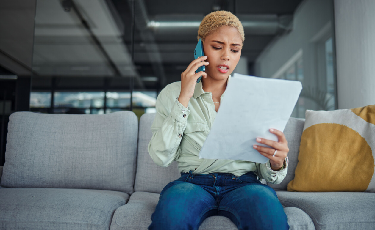 Home, phone call and serious woman with documents, conversation and connection with network. person, customer and girl with paperwork, angry or contact for discussion or communication of mobile user